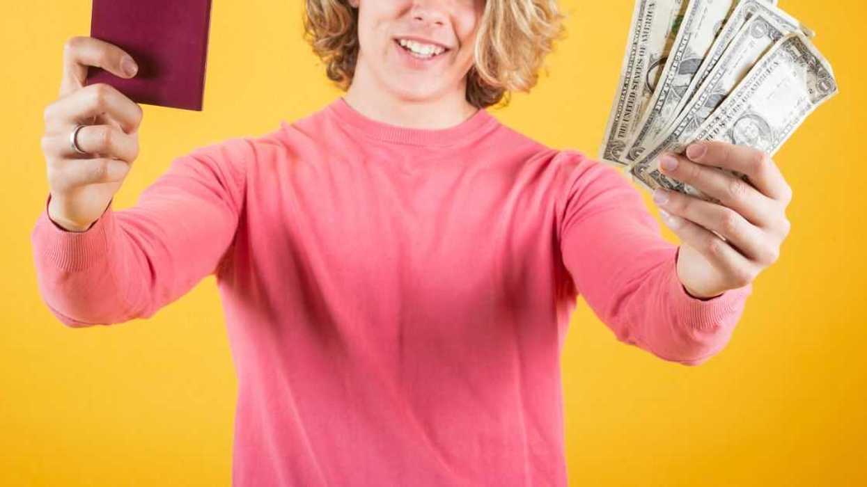 Teen holding money