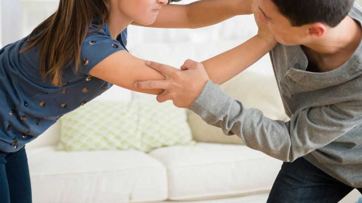 Teen siblings (girl/boy) in an altercation