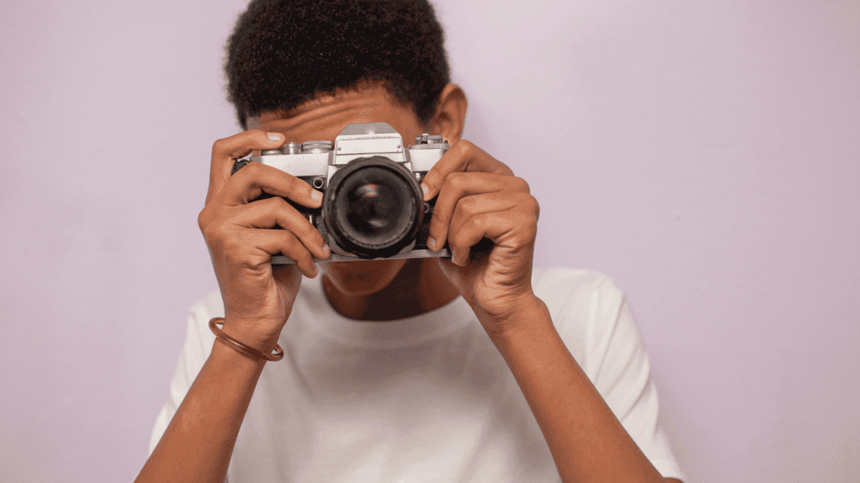 Teenage boy with Camera