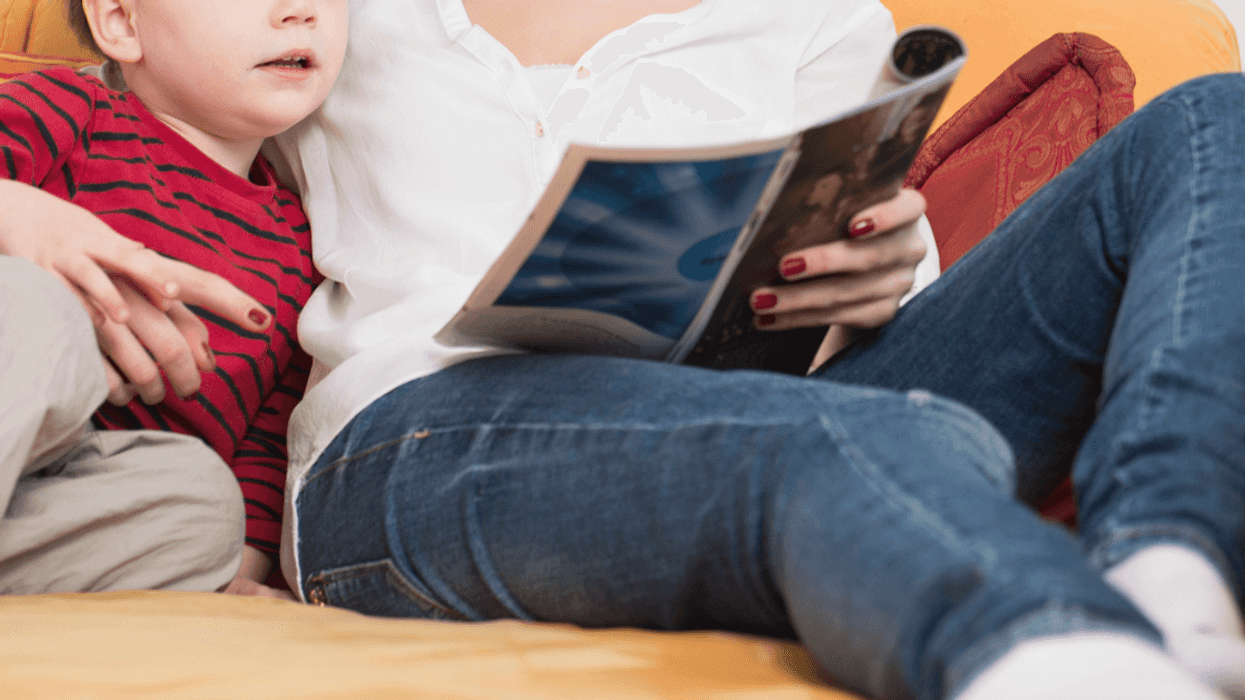 teenage girl babysitting little boy