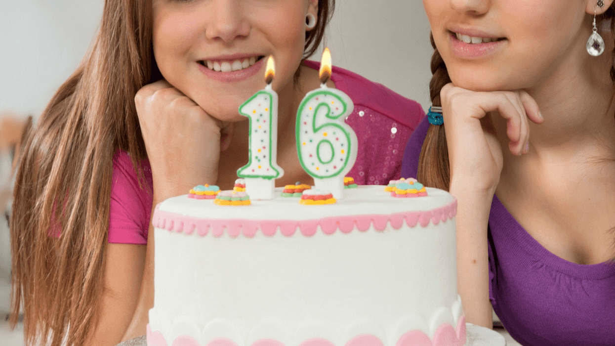 teens with 16th birthday cake
