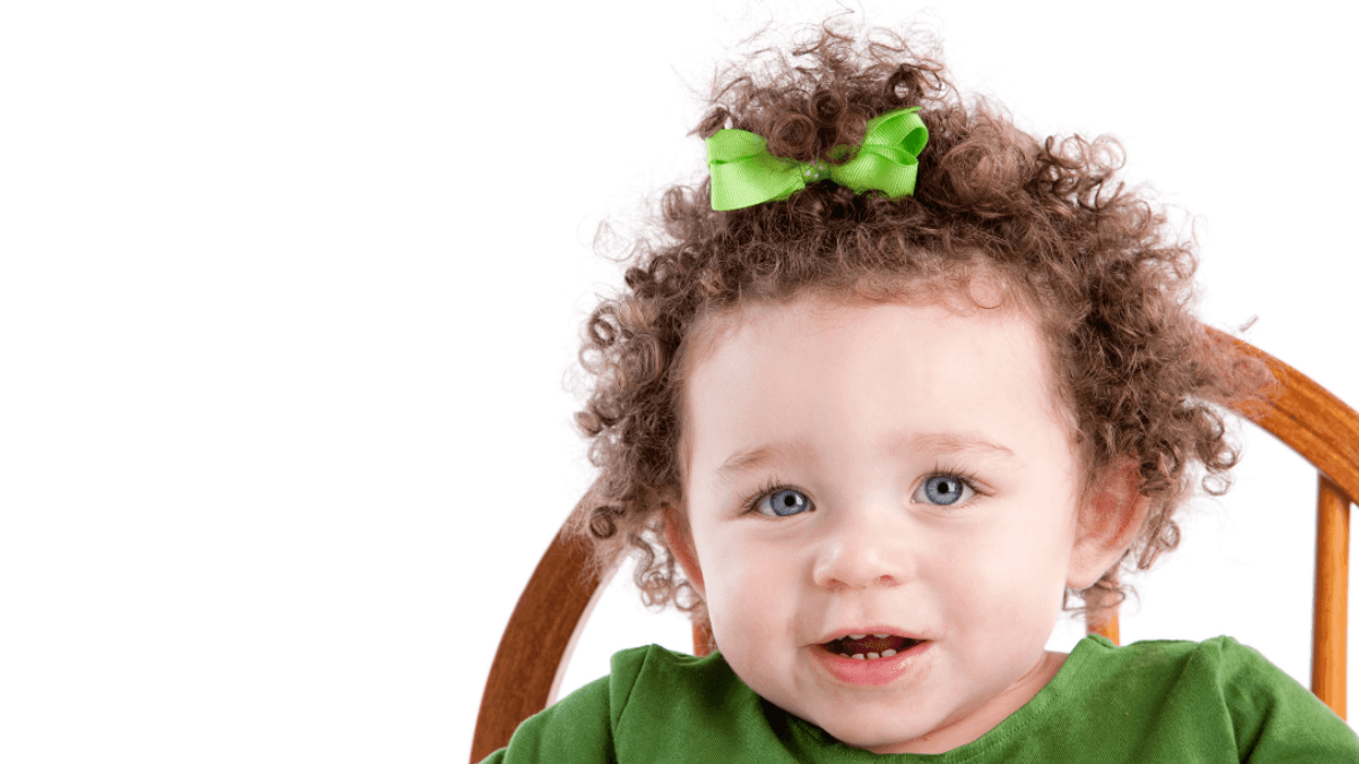 toddler with bow in her hair