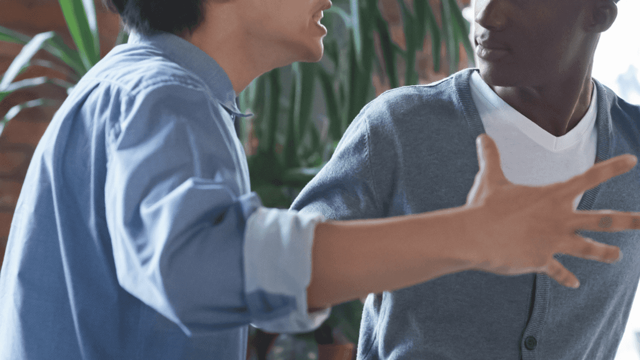 Two male roommates arguing