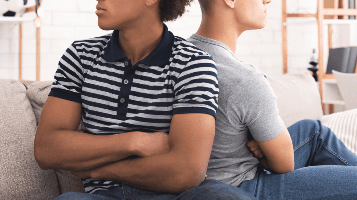 Two male roommates in argument