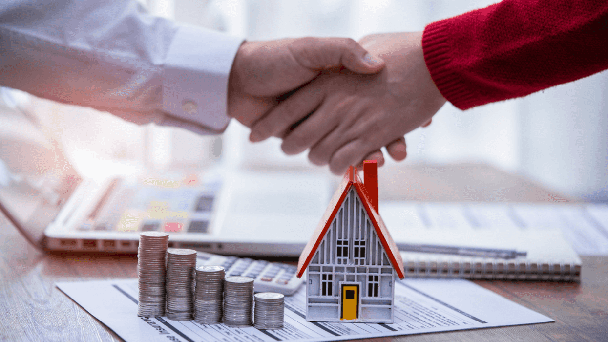 Two people negotiating a mortgage agreement