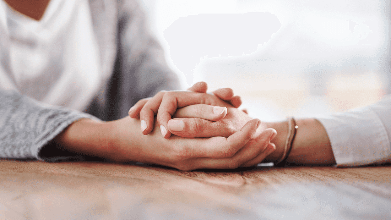 Two women comforting each other