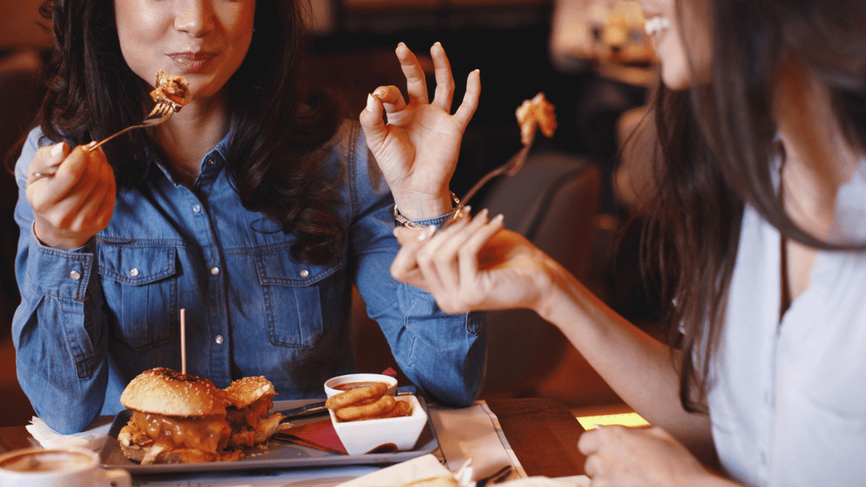 Two women enjoying dinner out together