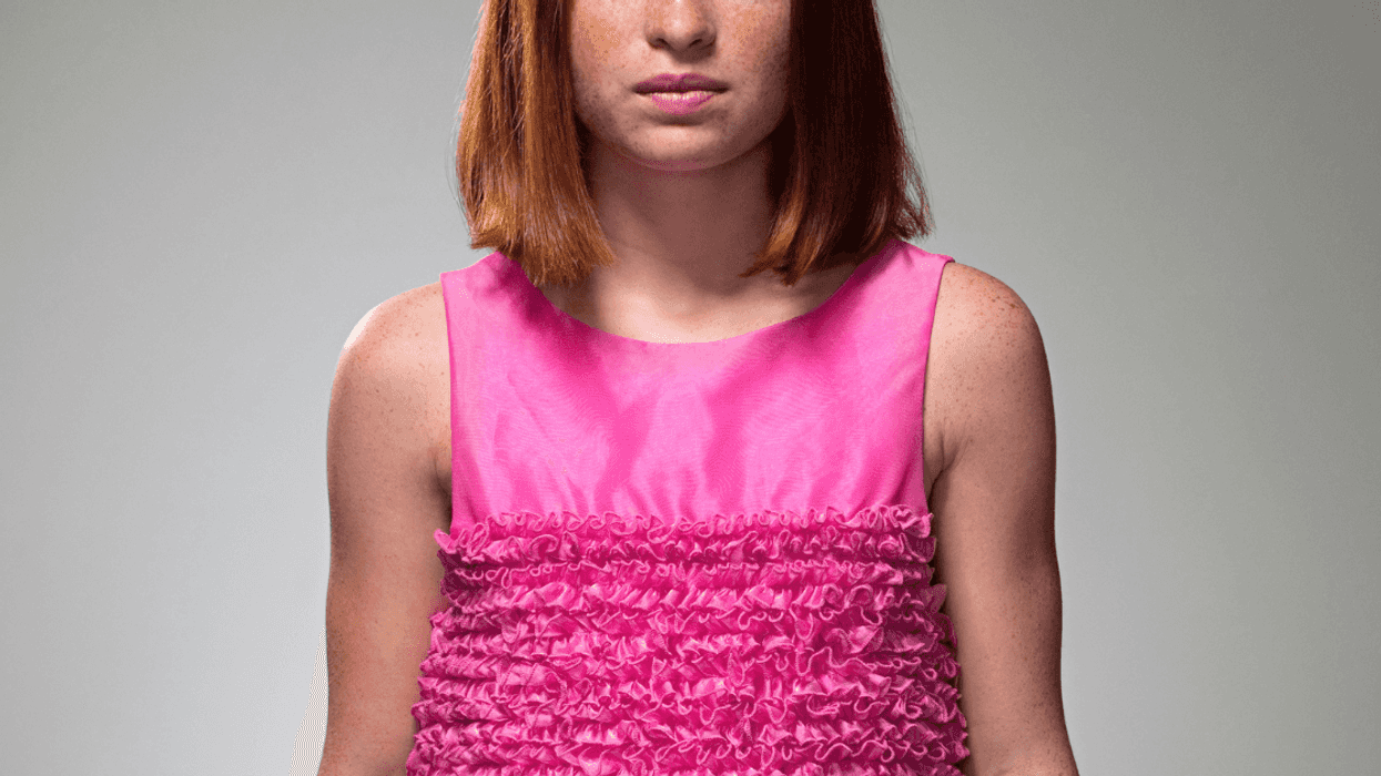 unhappy girl in pink prom dress