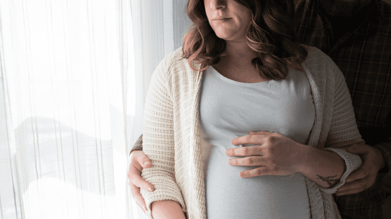 Unhappy pregnant woman