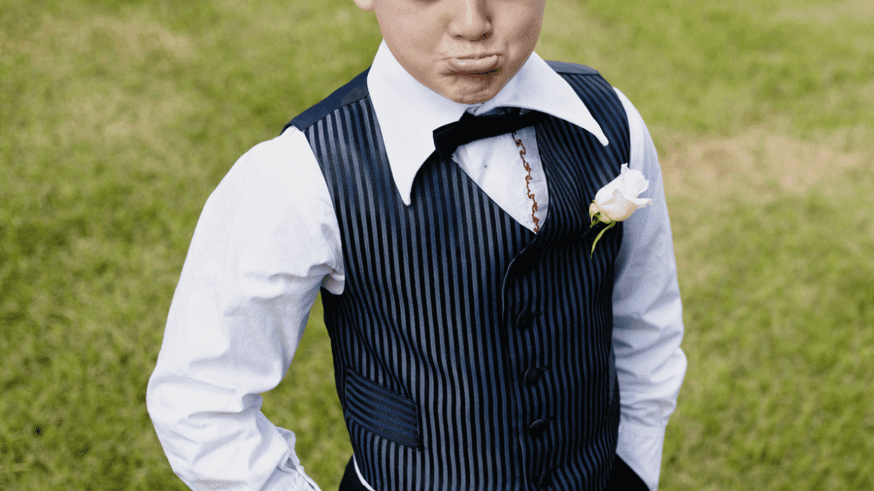 Upset boy wearing a suit