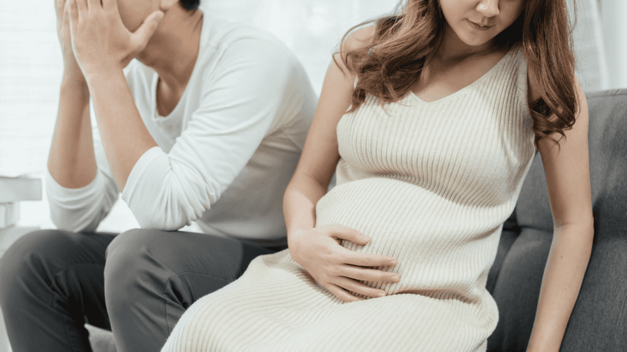 Upset expectant couple