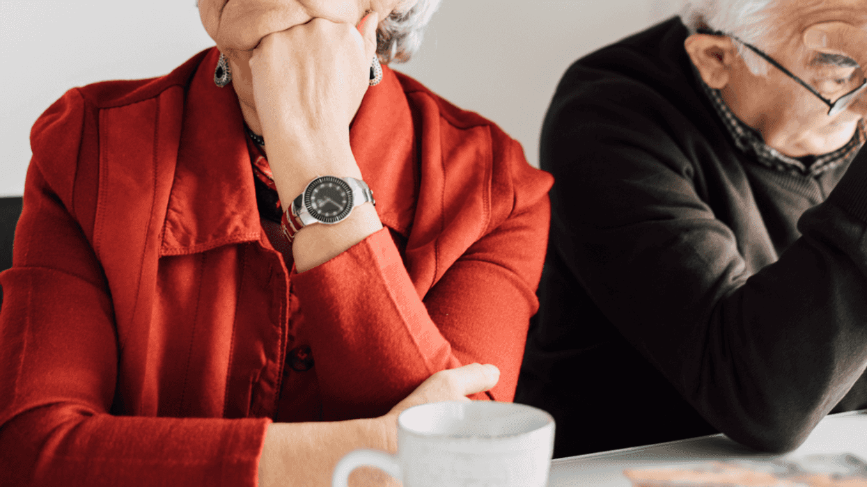 Upset looking older couple.