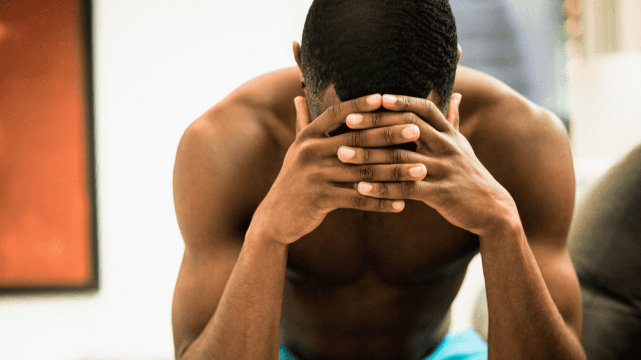 upset man with head in his hands