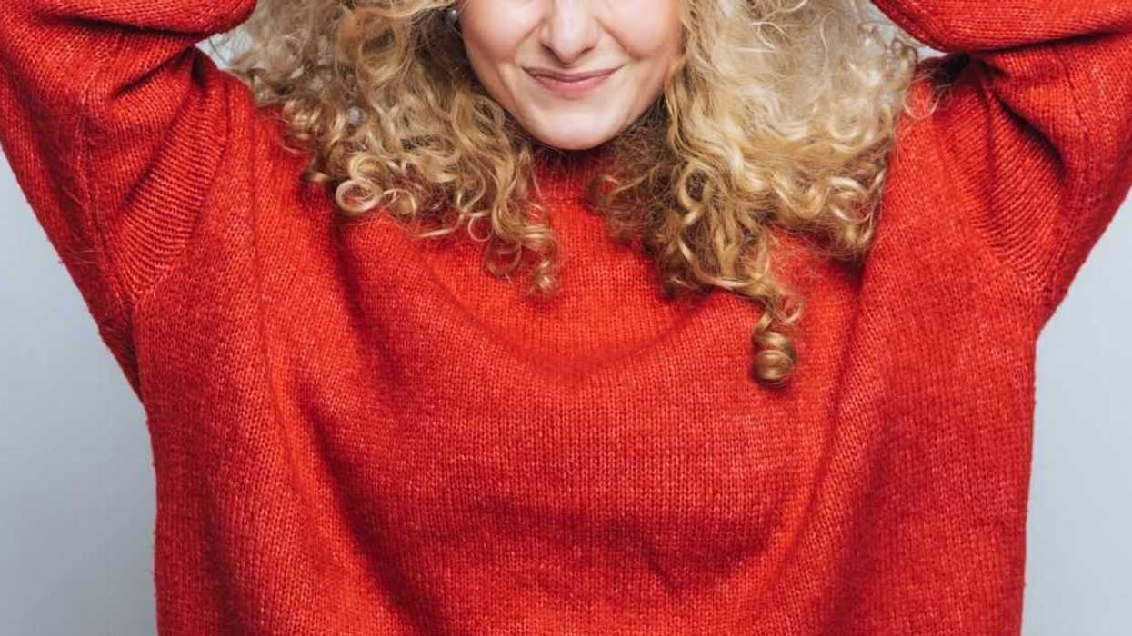 Woman Called Out For Buying Herself A Plus-Sized Sweater That's Several Sizes Too Big For Her