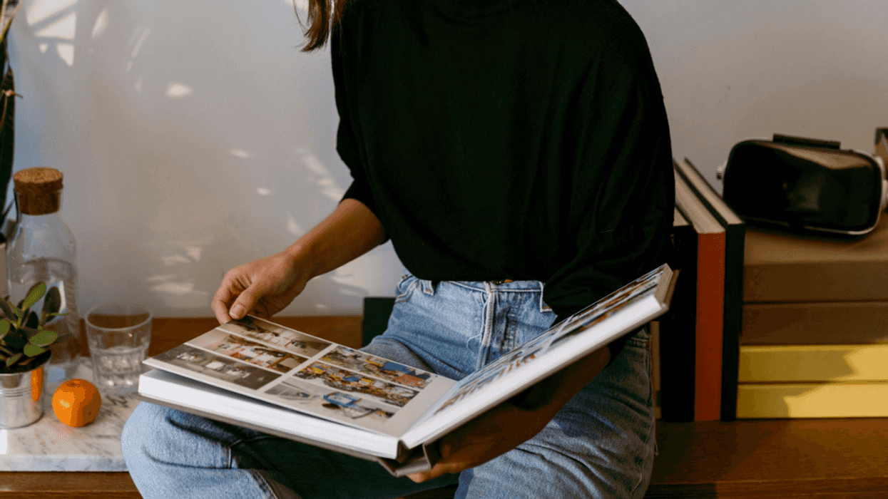 Woman Devastated When MIL Excludes Her From Family Photo Album Because She Can't Have Kids