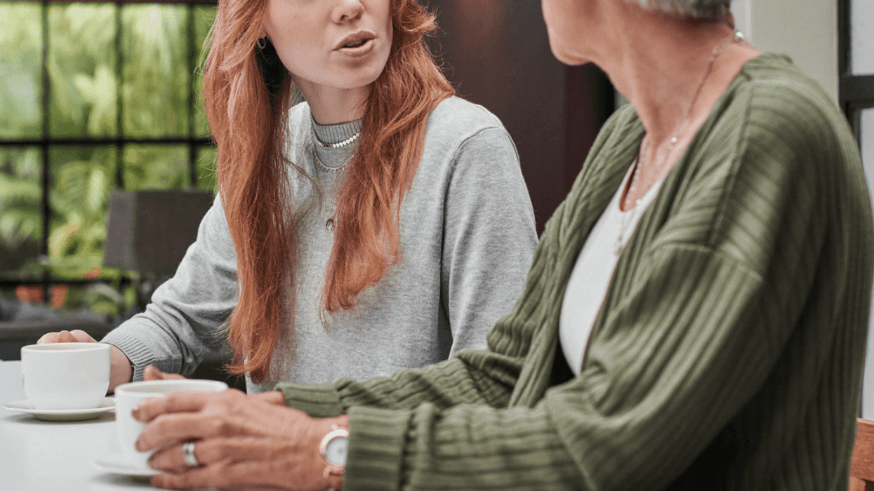 Woman and elderly mother arguing in public
