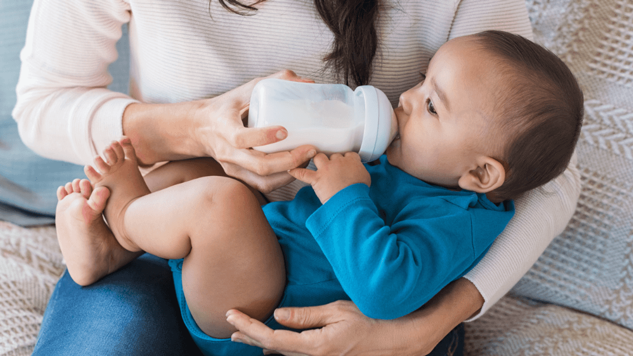 Woman bottlefeeding a baby