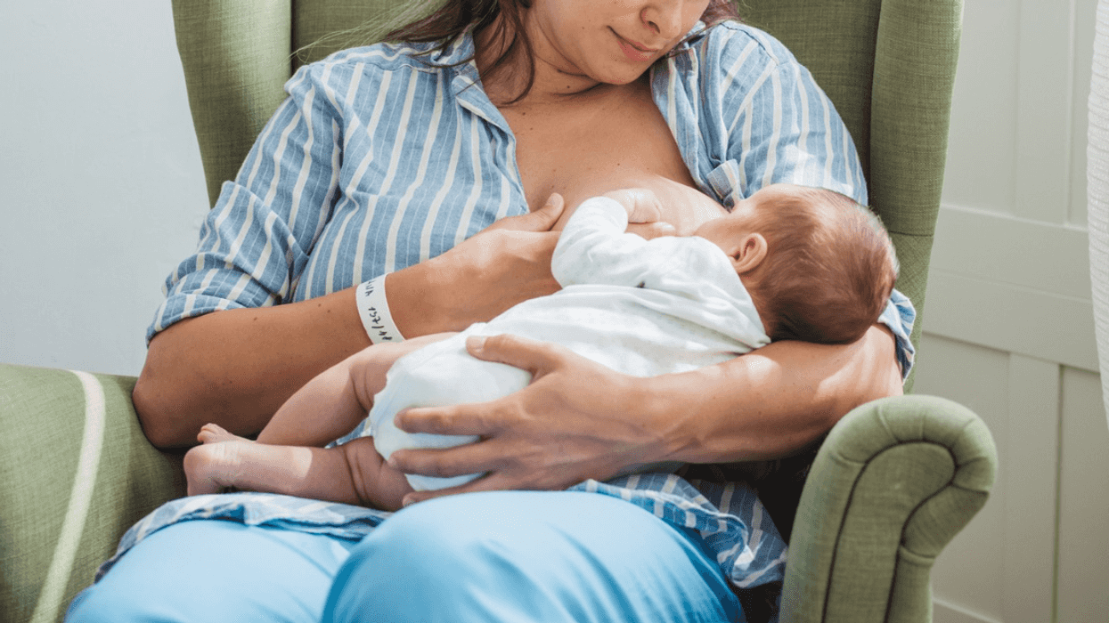 woman breastfeeding infant