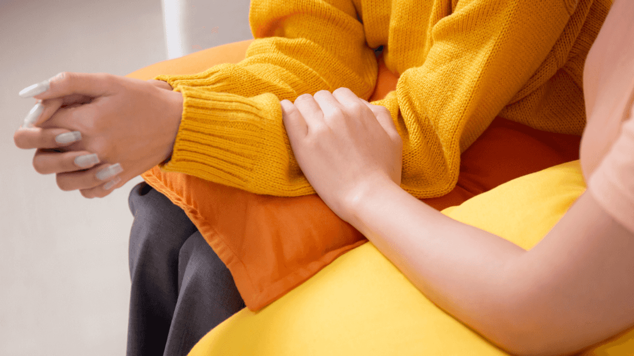 Woman comforting a friend