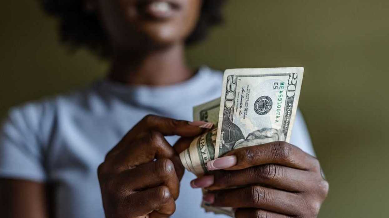 Woman counting cash