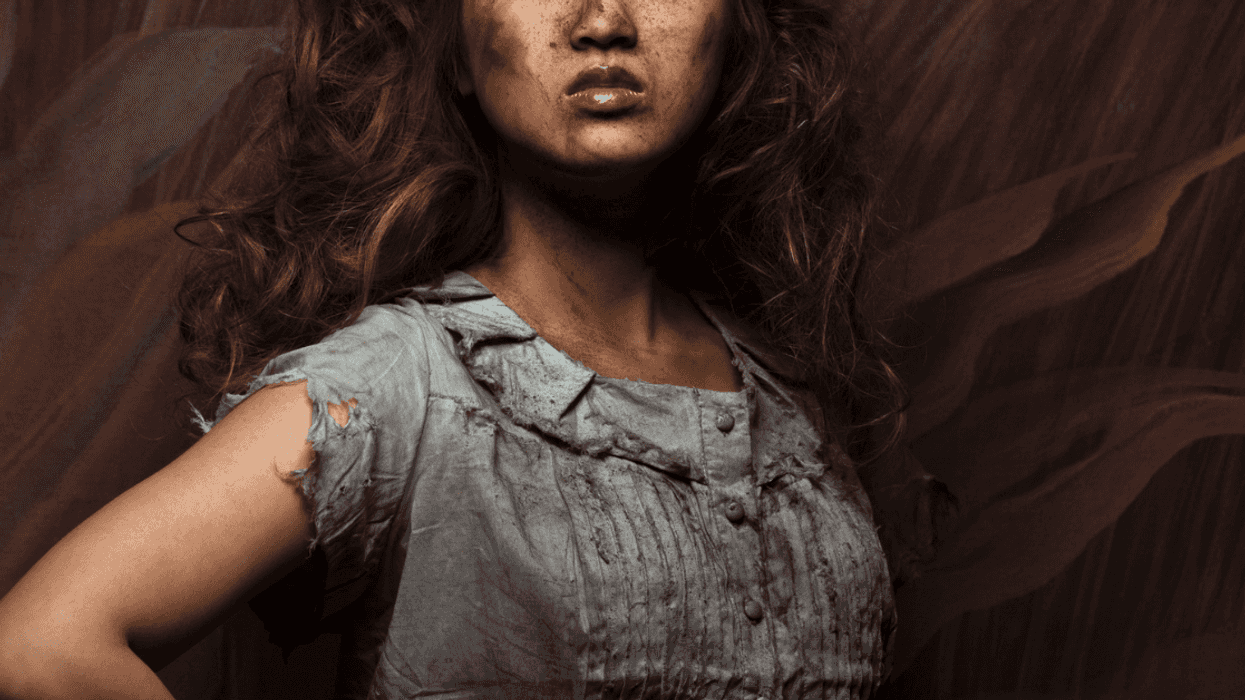 Woman covered in dirt