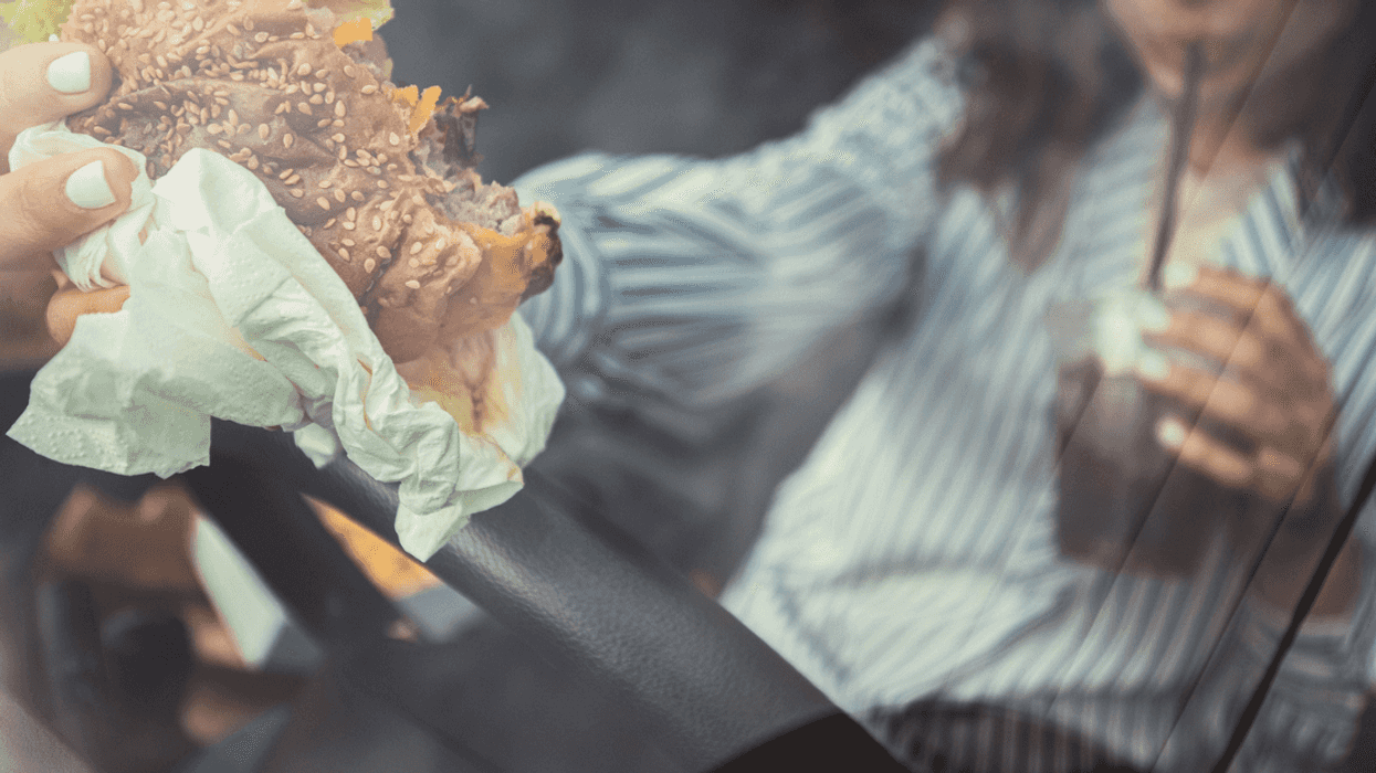 Woman eating while driving