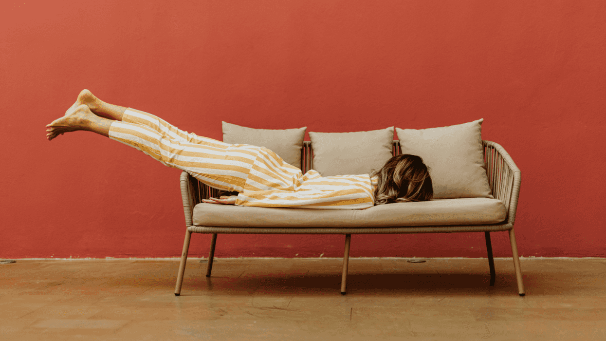 Woman face down on couch