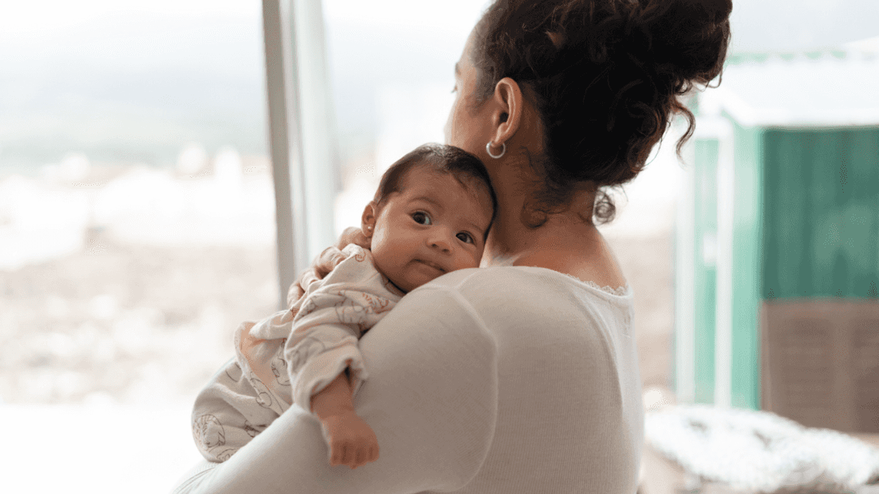 Woman holding a baby