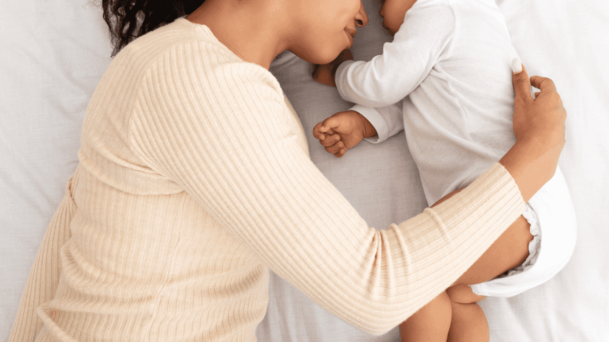 Woman holding her newborn baby