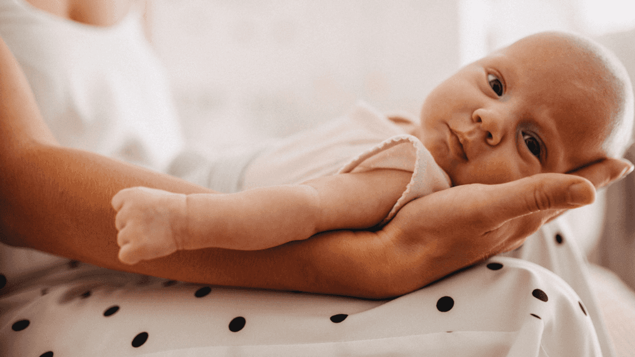 woman holding infant