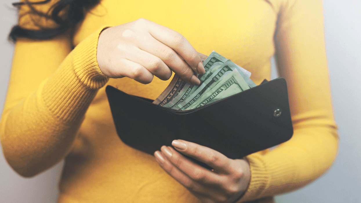 Woman holding wallet