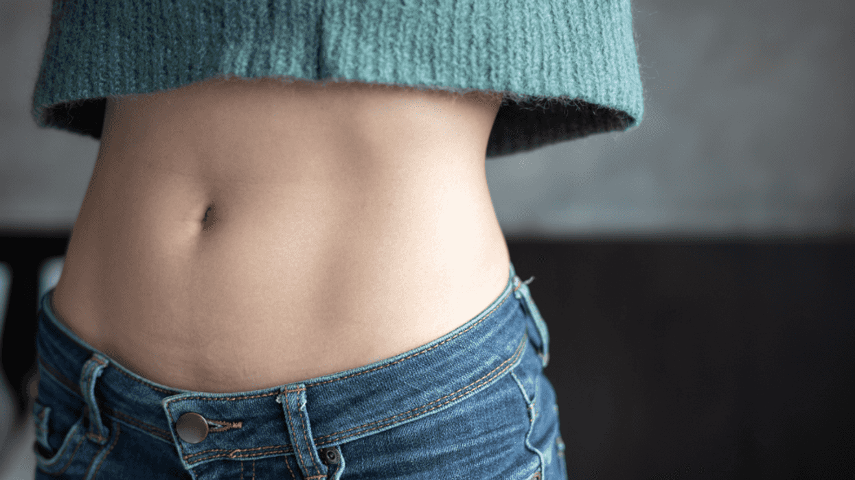 woman in crop top showing exposed midriff