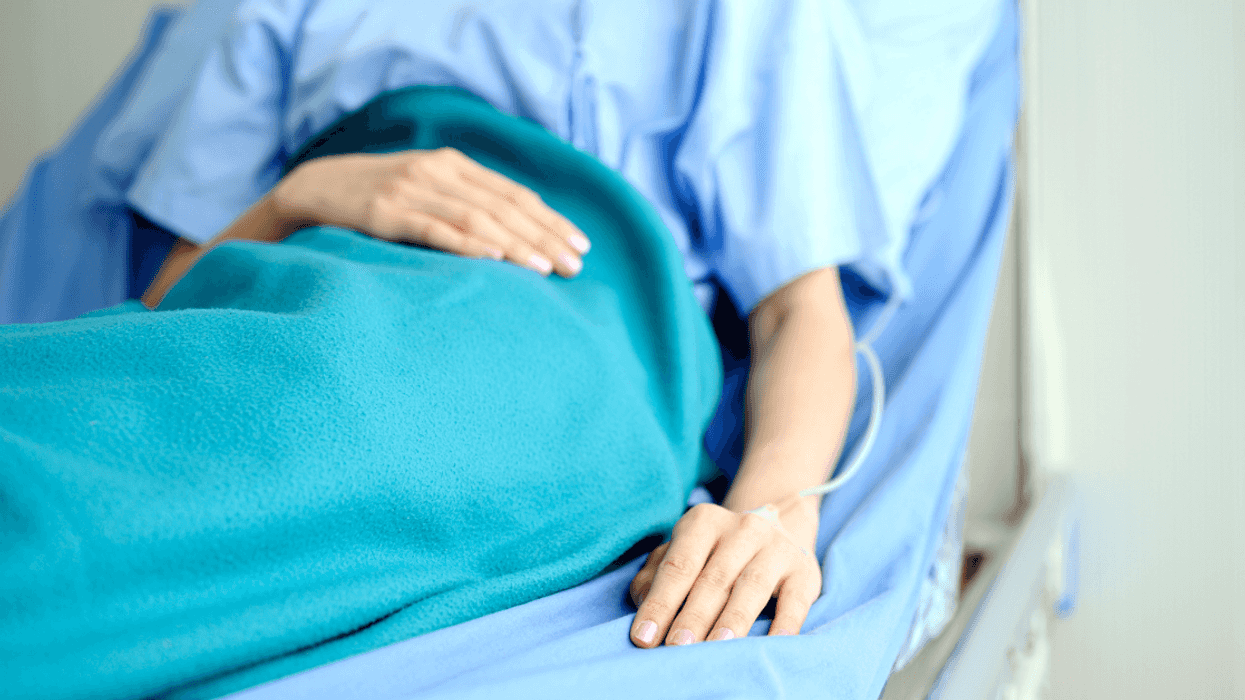 Woman in hospital bed
