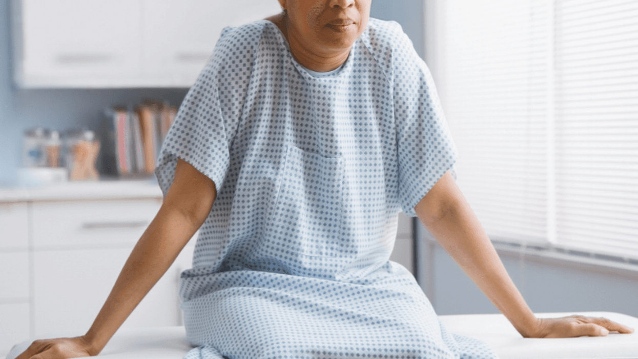 Woman in hospital gown