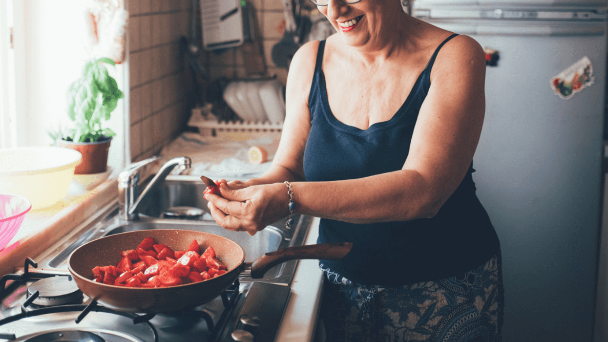 Woman in the kitchen cooking