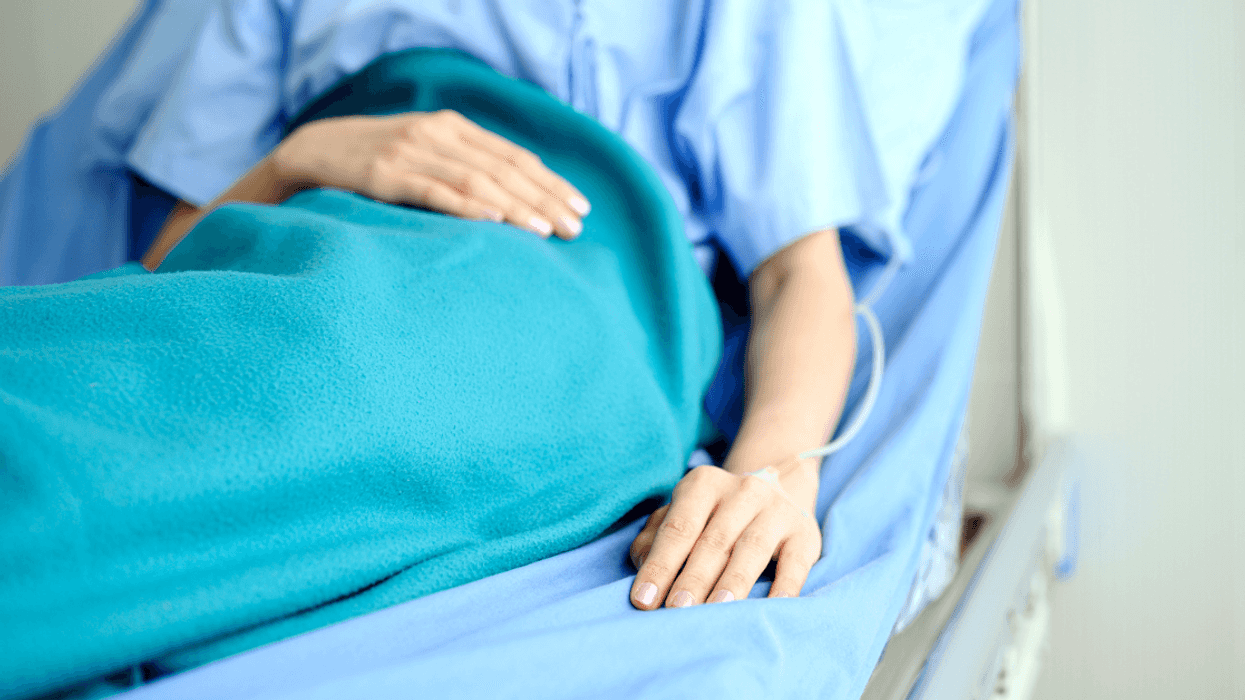 Woman lying in a hospital bed