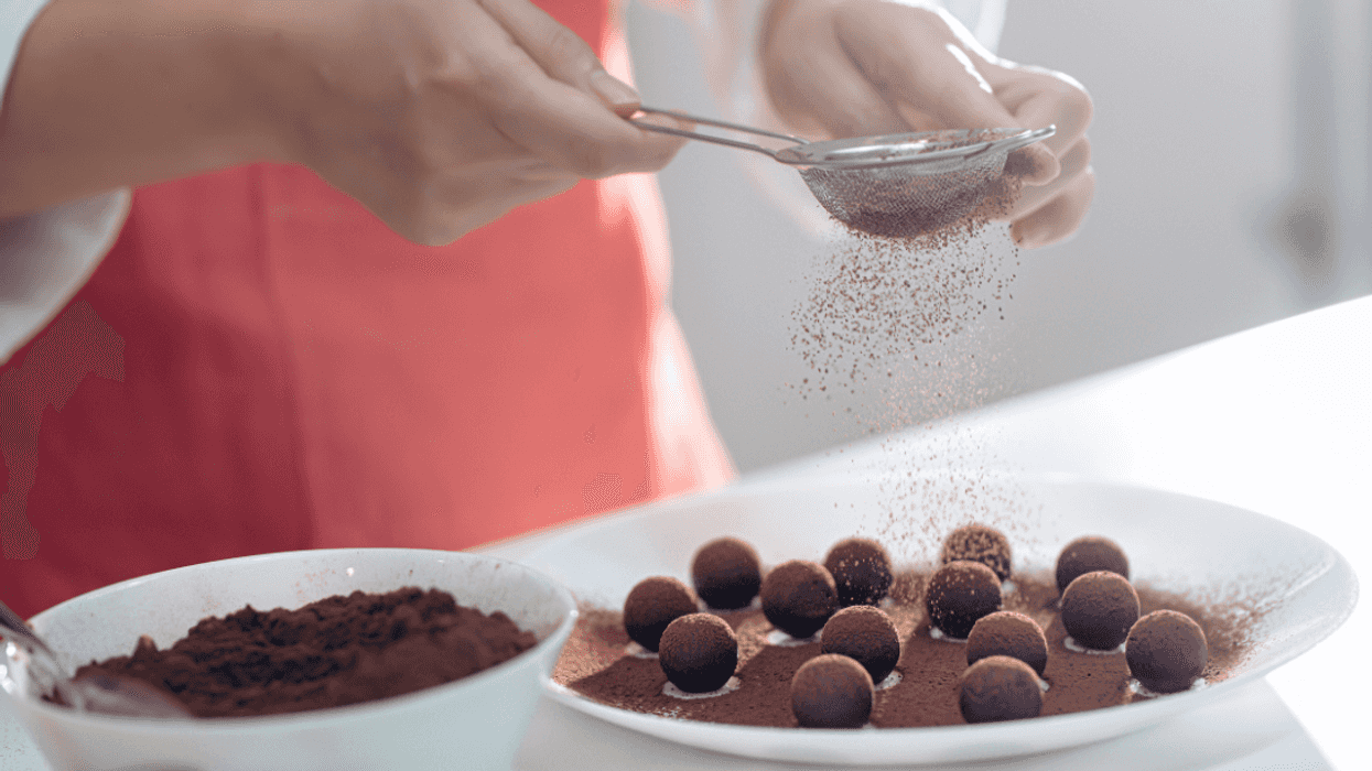 woman making homemade chocolate truffles