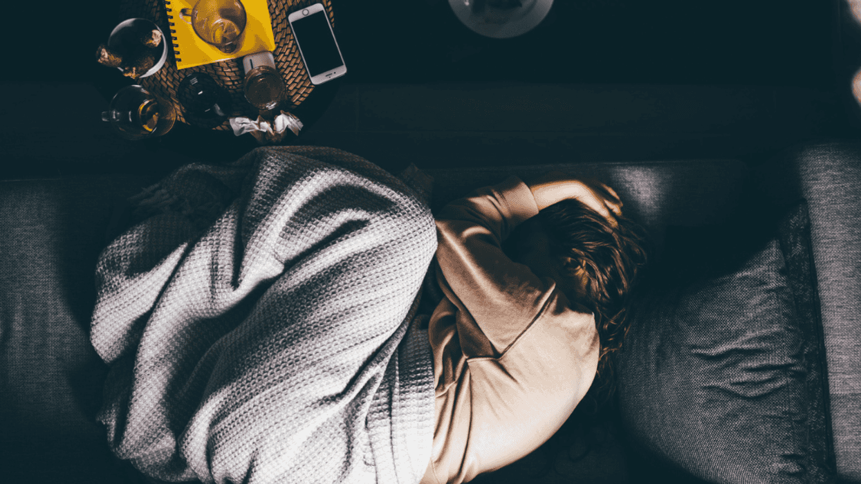 Woman on the floor weeping
