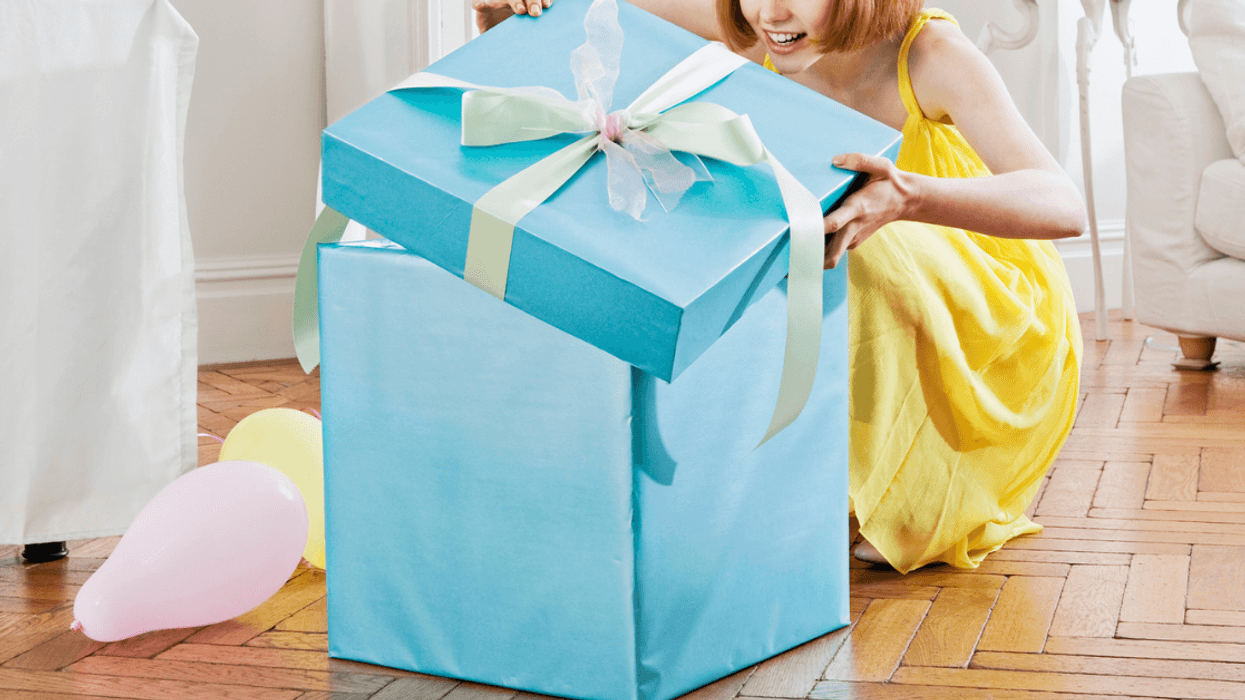 Woman opening gift