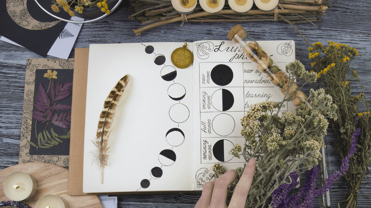 woman prepares Wiccan ritual