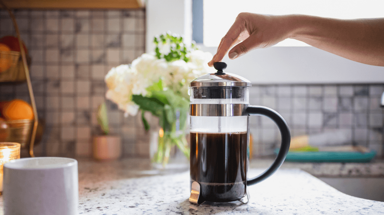 Woman preparing coffee