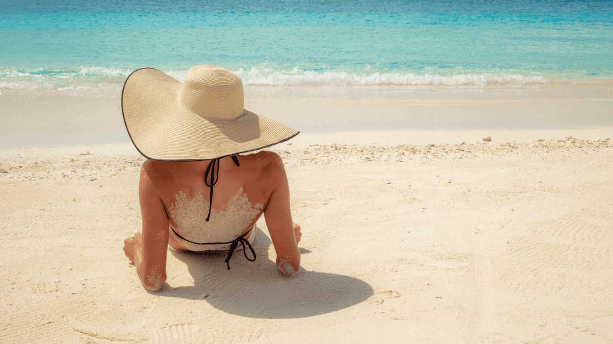 Woman relaxing on the beach