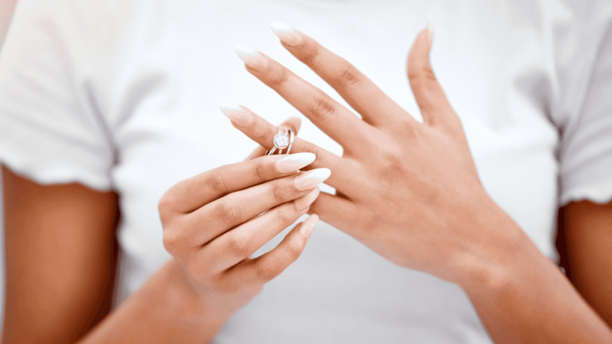 Woman removing her ring