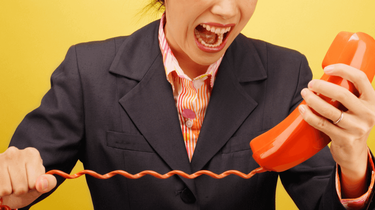 Woman screaming at her phone