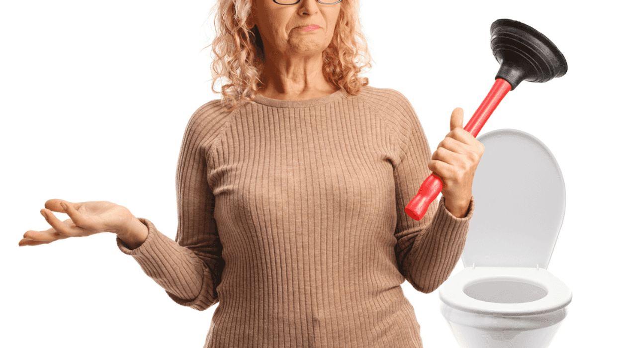 Woman shrugging while holding a toilet plunger