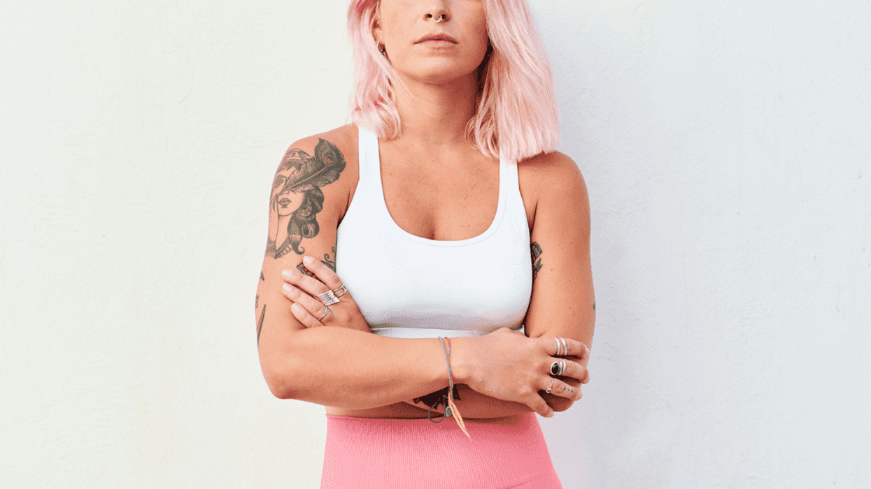 woman standing with crossed arms