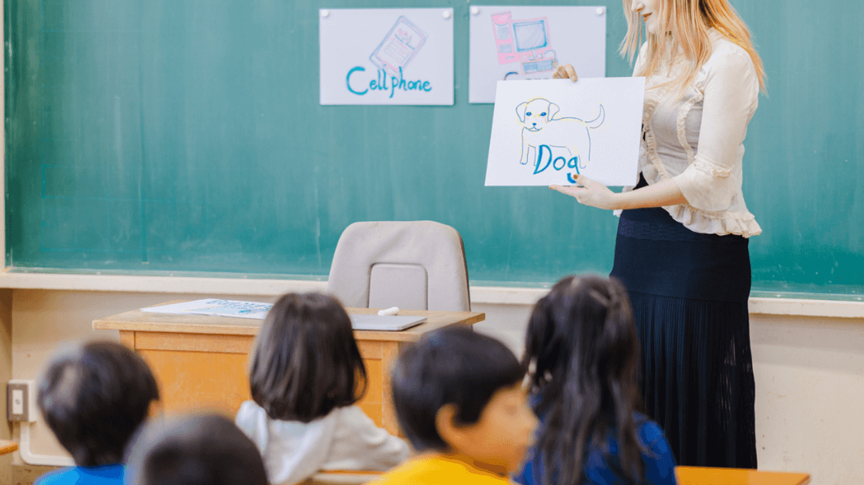 Woman teaching Japanese students