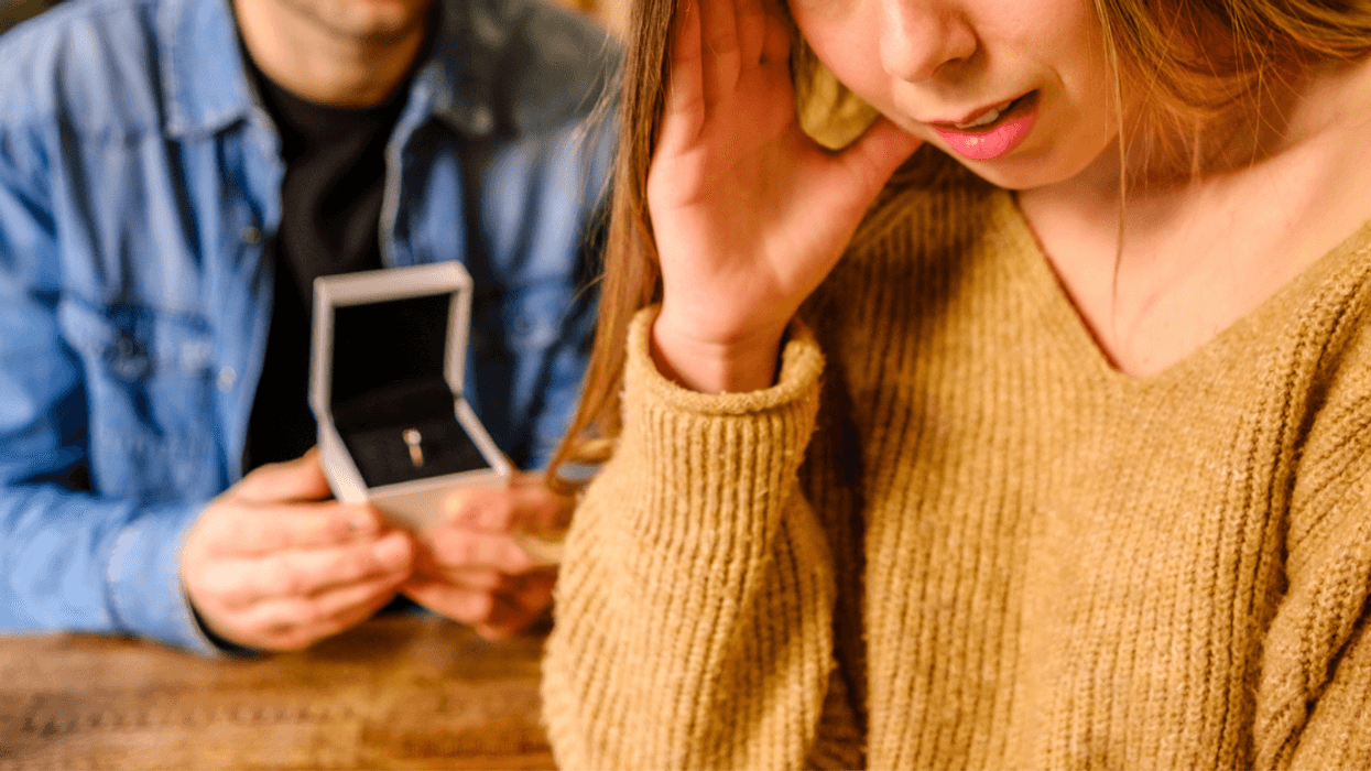Woman unhappy with the engagement ring presented during proposal
