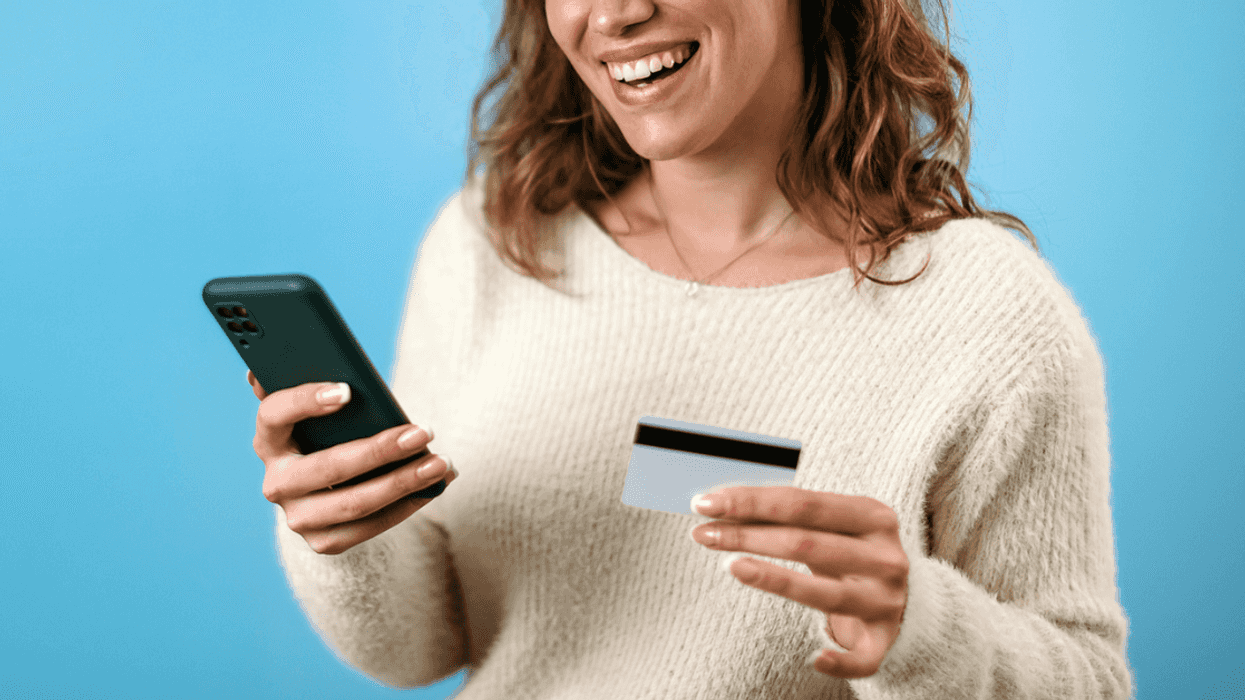 Woman using a credit card
