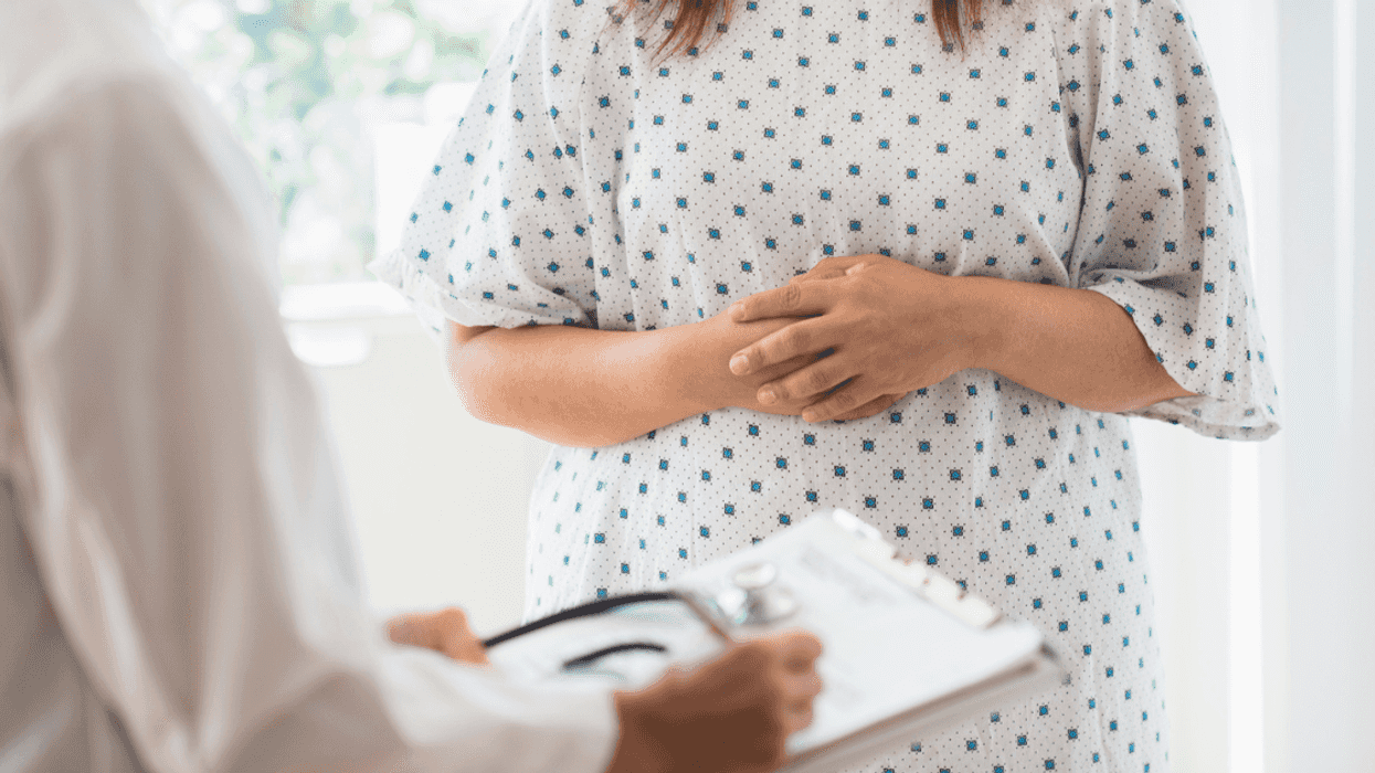 Woman wearing a hosptial gown